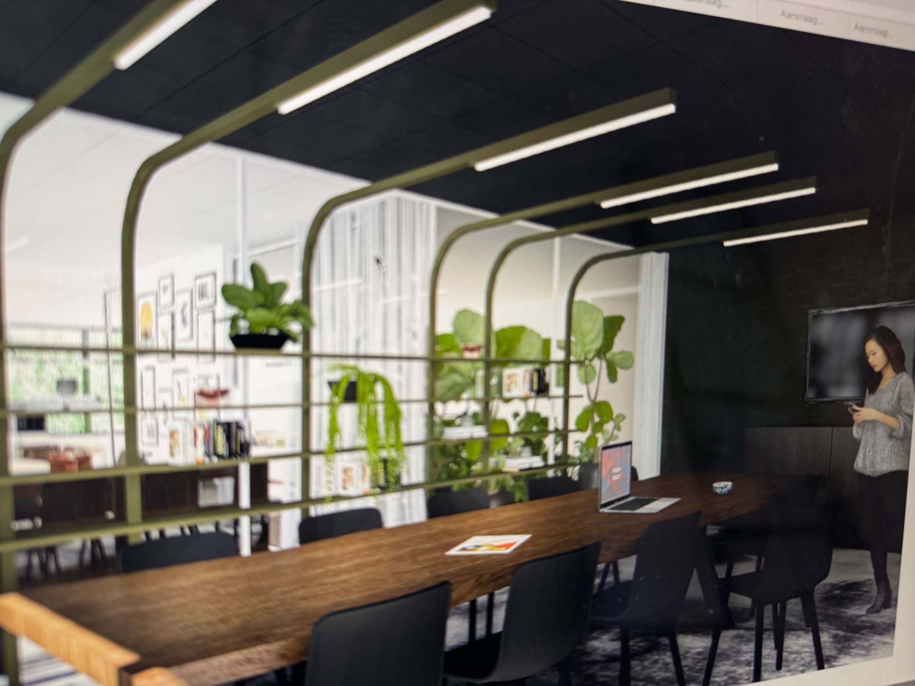 Lange houten vergadertafel met groene open kast